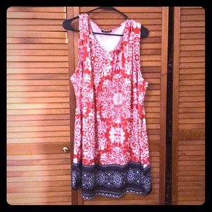 Knee length dress. Never worn, no tags